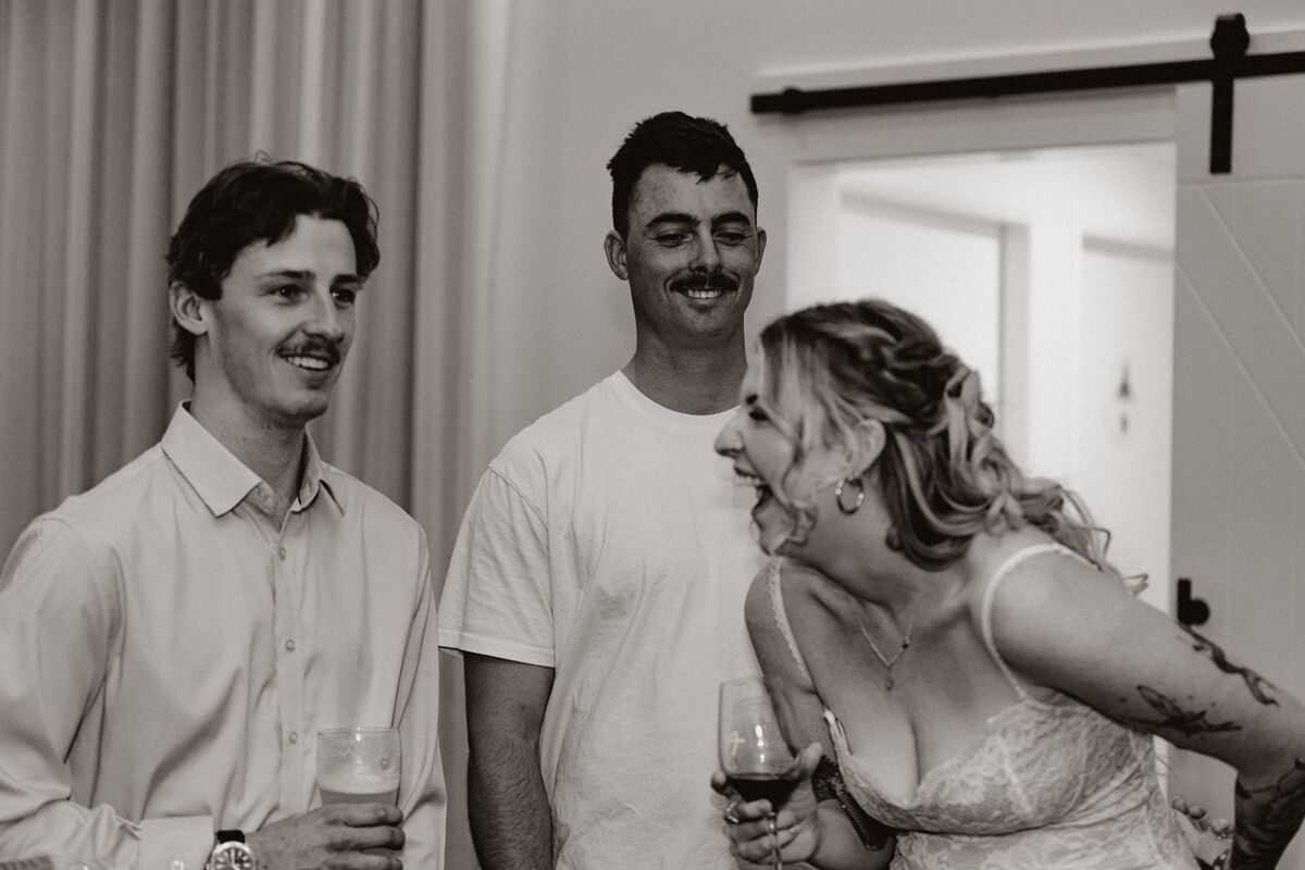 Guests reacting to comedy hypnosis performance