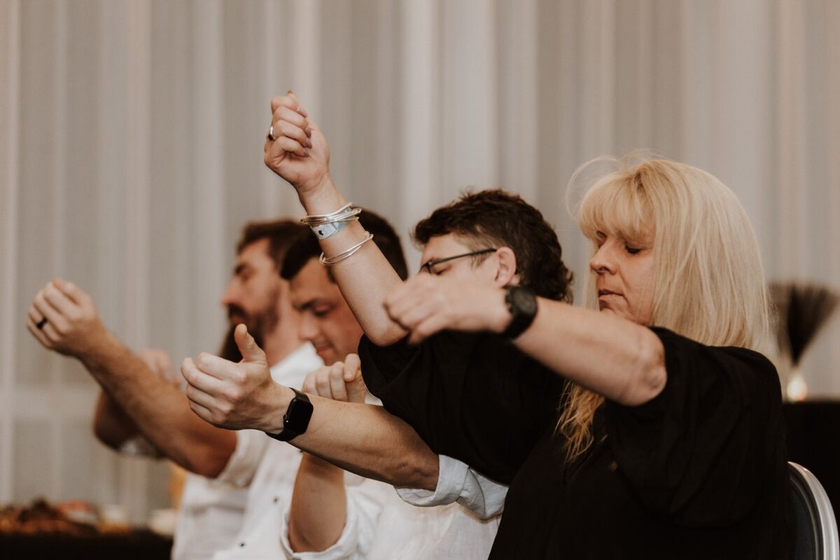 Volunteers in trance during comedy hypnosis performance